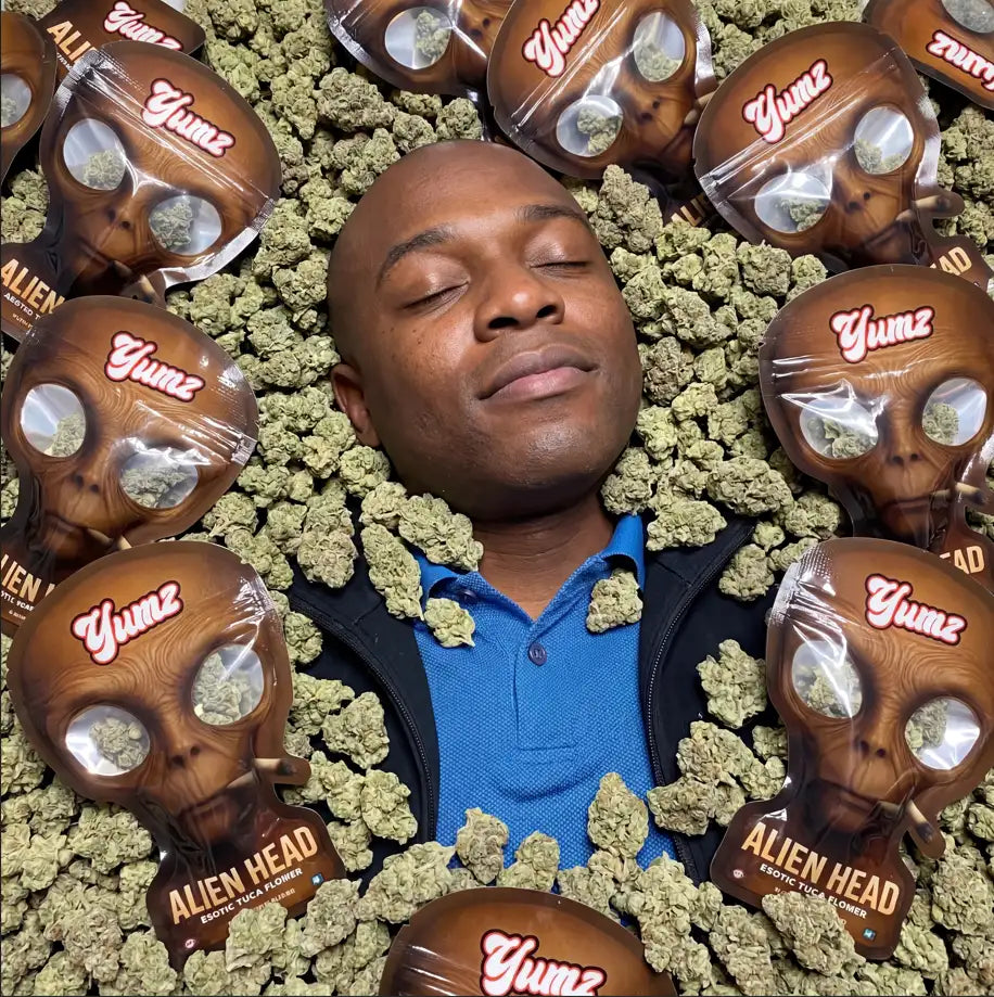 Brown alien-shaped packages of yumz alien head cannabis flower.